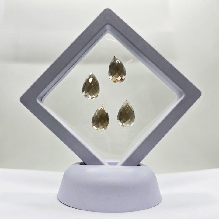 Lotto con 4 Quarzi Fume' Taglio: Goccia 10x15 mm - 26,09 ct