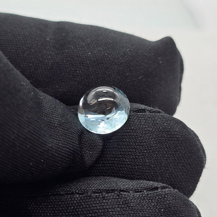 Cabochon-Cut Blue Topaz Round Faceted 10 mm - 4.91 ct